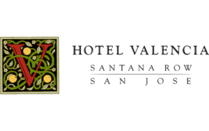 Hotel Valencia Santana Row exterior view at sunset with warm lighting.