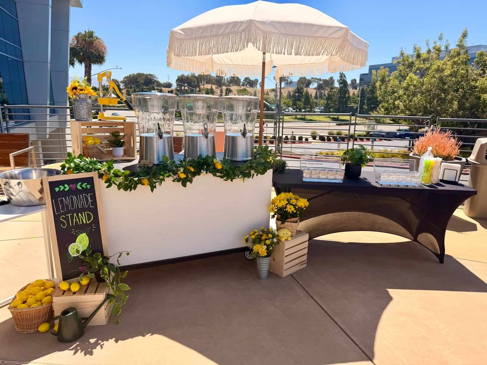 Mobile coffee catering Bay Area with espresso cart and umbrella setup.